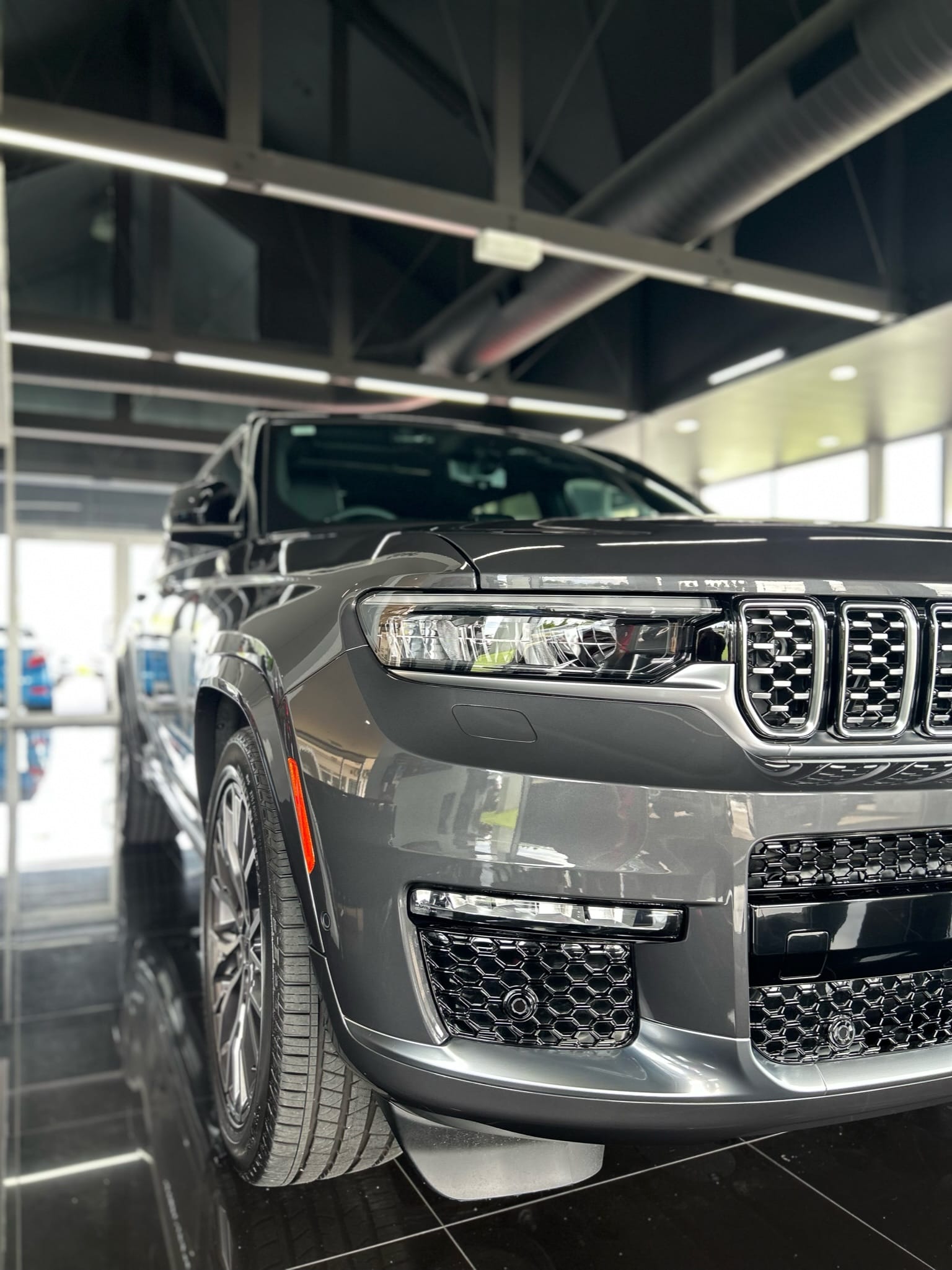 Jeep Grand Cherokee detailed at dealership showroom